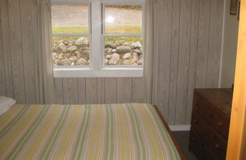 Cabin bedroom at Red Cedar Springs Resort.