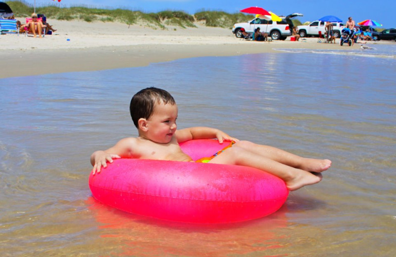 Kid On Tube at Hatteras Realty