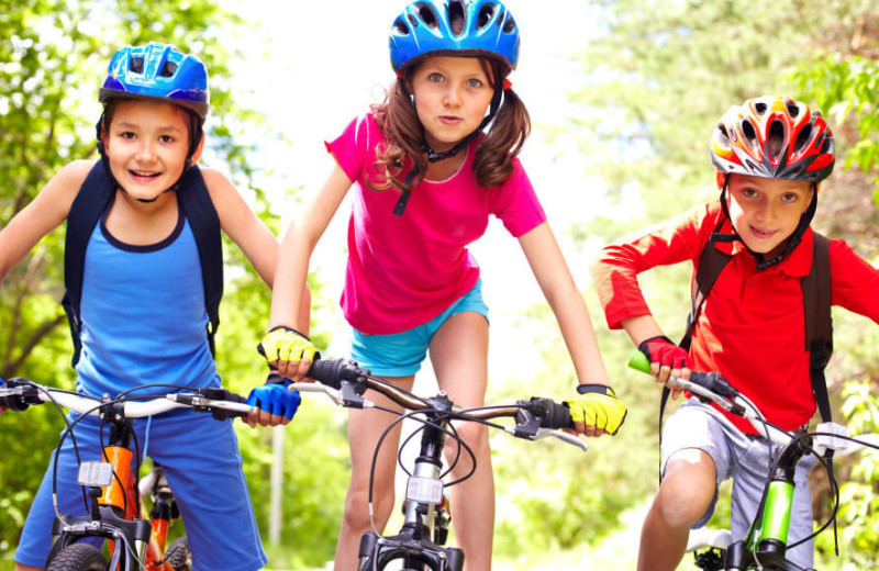 Kids biking at Westgate Branson Woods Resort.