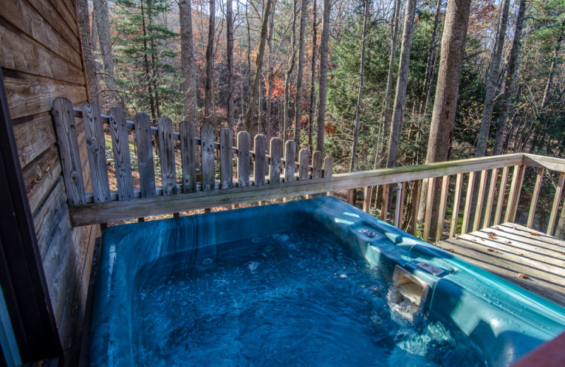 Cabin hot tub at Asheville Cabins of Willow Winds.