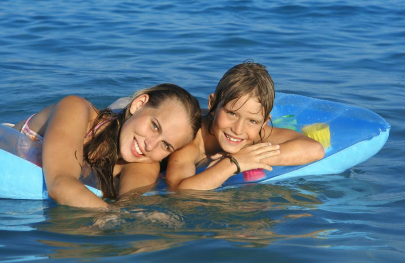 Family swimming at Homestead Suites.