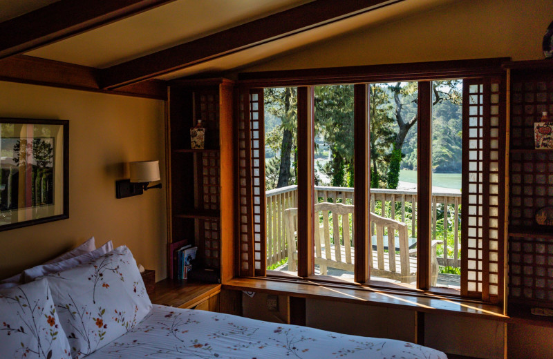 Cottage bedroom at Alegria Oceanfront Inn & Cottages.