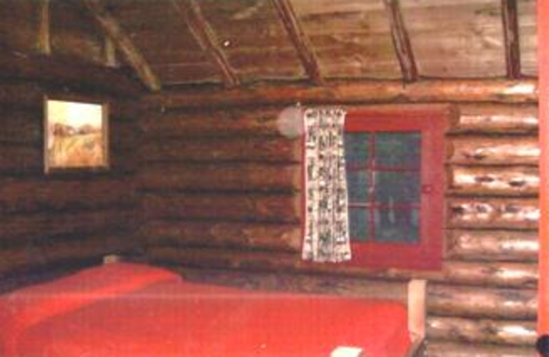 Cabin bed at Pine Grove Lodge.