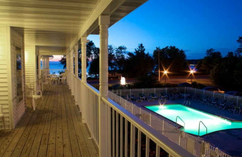 Deck view of outdoor pool at Bay Breeze Resort.