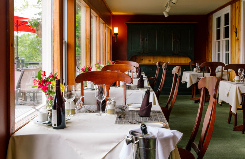 Lake view dining with a four course dinner for a culinary experience at Heather Lodge.