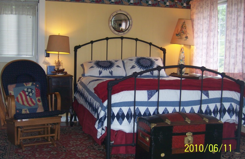 Cottage bedroom at Enchanted Cottages.