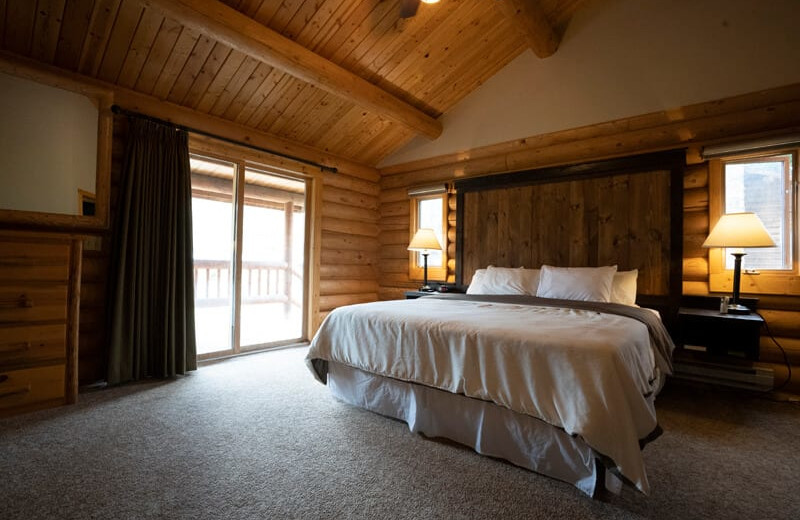 Cabin bedroom at 320 Guest Ranch.