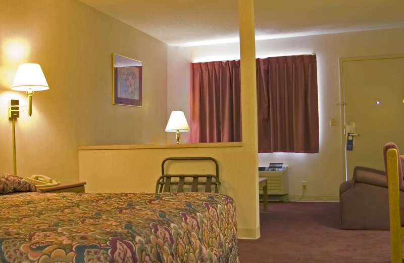 Guest room at Harrisonville Inn and Suites.