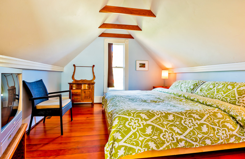 Cottage bedroom at Seabreeze Vacation Rentals, LLC.