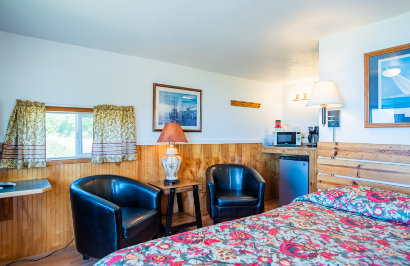 Cabin bedroom at Oceanside Ocean Front Cabins.