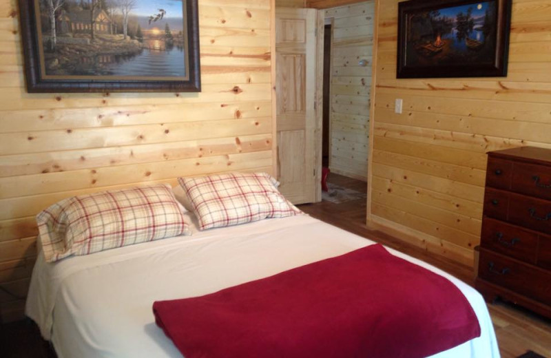 Cabin bedroom at The Landing Resort.