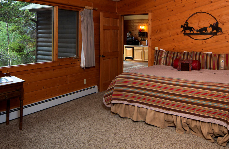 Cabin bedroom at Wind River Ranch.