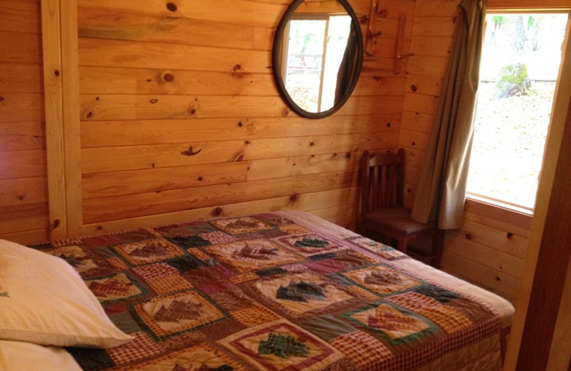 Cabin bedroom at Cedar Point Resort.