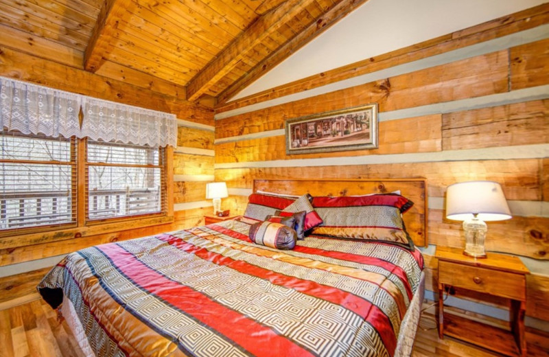 Cabin bedroom at TNT Cabin Rentals.