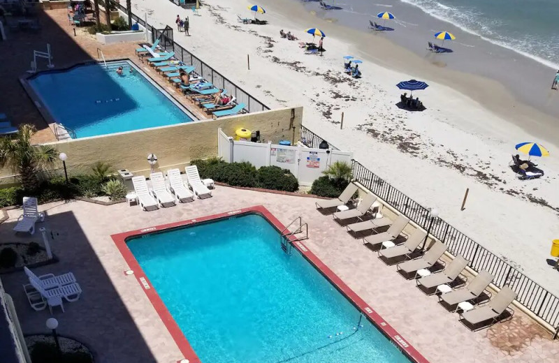 Pool and beach at Beachside Motel.