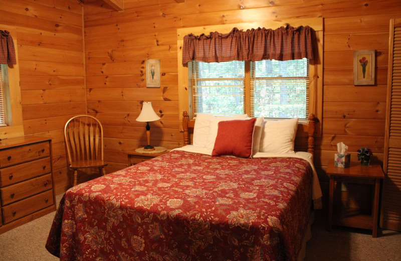 Cabin bedroom at Country Road Cabins.