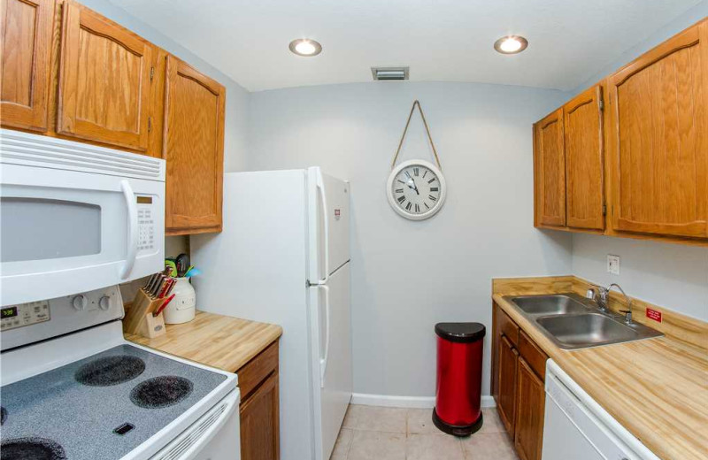 Rental bedroom at Surf Song Resort Condominiums.