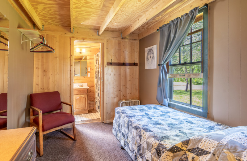 Cabin bedroom at Rising Eagle Resort.