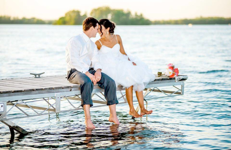 Couple on dock at Bay Pointe Inn.