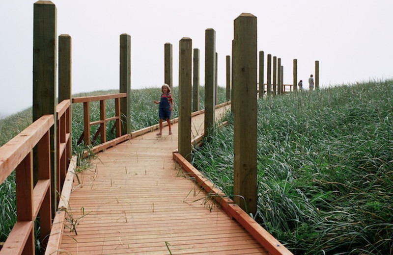 Jogging on boardwalk at Shorepine Vacation Rentals.