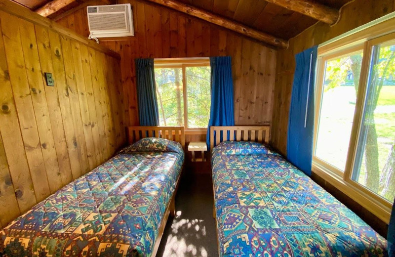 Cabin bedroom at Pehrson Lodge Resort.