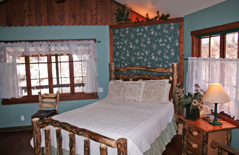 Cabin bedroom at Fawn Valley Inn.