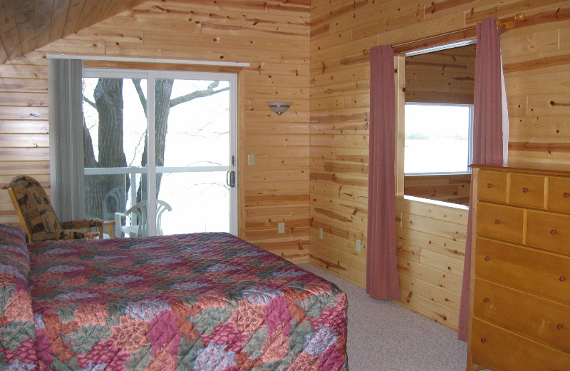 Cabin bedroom at Dickerson's Lake Florida Resort.