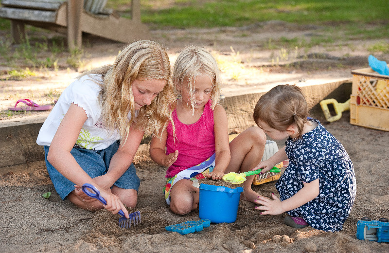 Kids on beach at Eagles Nest Resort.