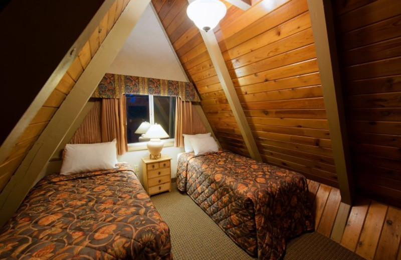 Guest bedroom at Douglas Fir Resort & Chalets.