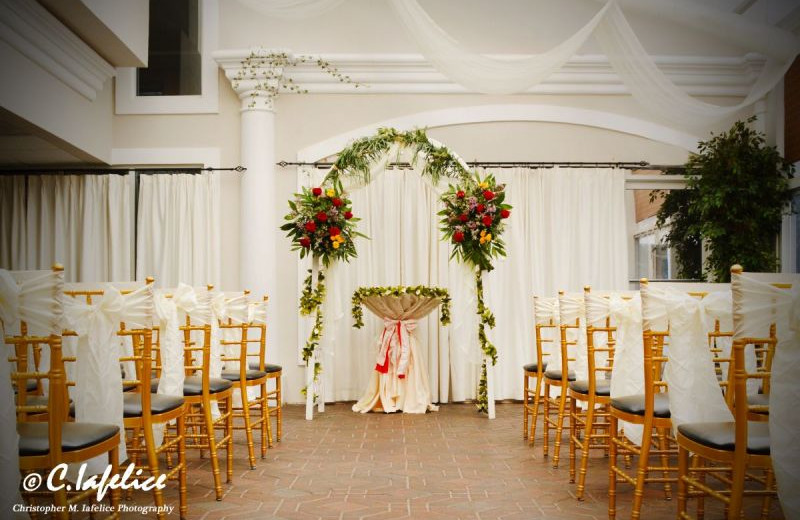 Wedding ceremony at The White Sands Oceanfront Resort & Spa.