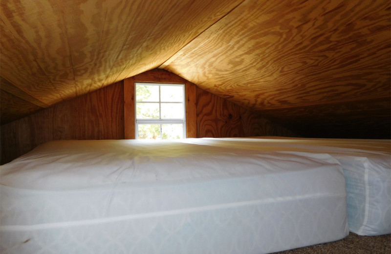 Cabin bedroom at Jellystone Park at Lake Monroe.