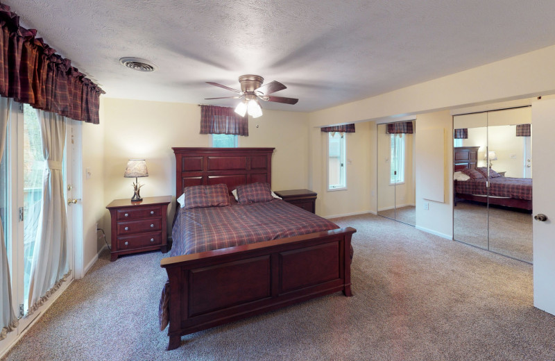 Cabin bedroom at 1st Choice Cabin Rentals.