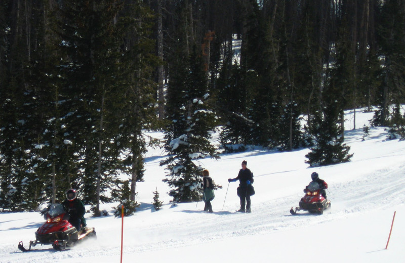 Skiing and snowmobiling at Color Country Motel.