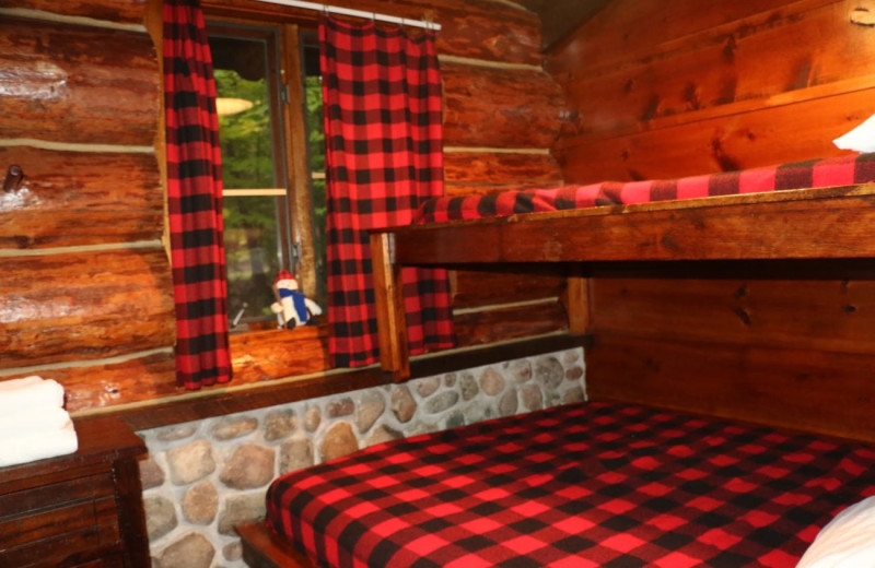 Cabin bedroom at Drummond Island Resort and Conference Center.