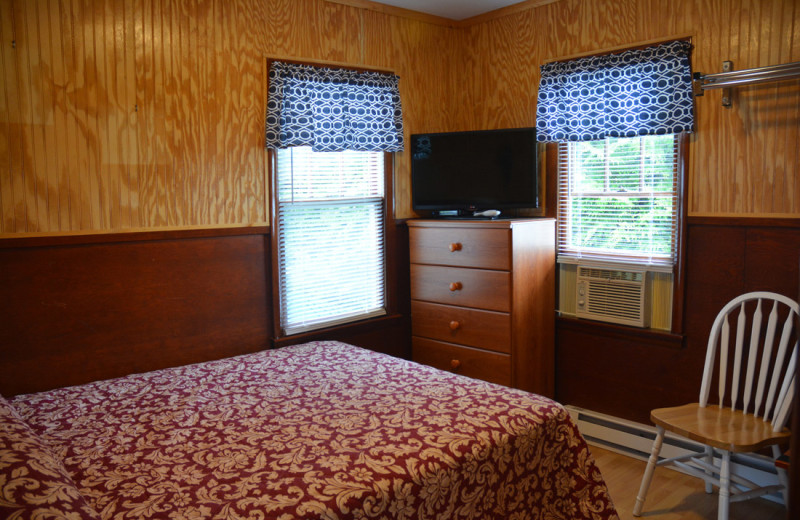 Cottage bedroom at Channel Waterfront Cottages.