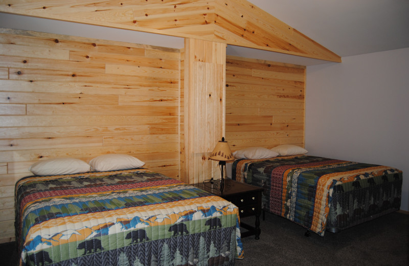 Cabin bedroom at Sandy Pines Resort.