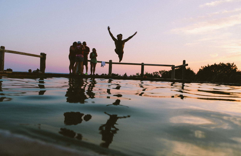 Jumping in lake at Bobs Lake Cottages.