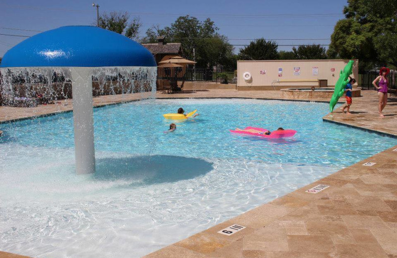 Outdoor pool at Hill Country RV Resort & Cottage Rentals.