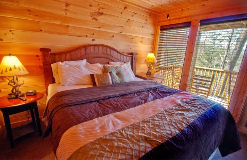 Cabin bedroom at Accommodations by Parkside Resort.