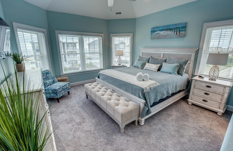 Rental bedroom at Sandbridge Blue Vacation Rentals.