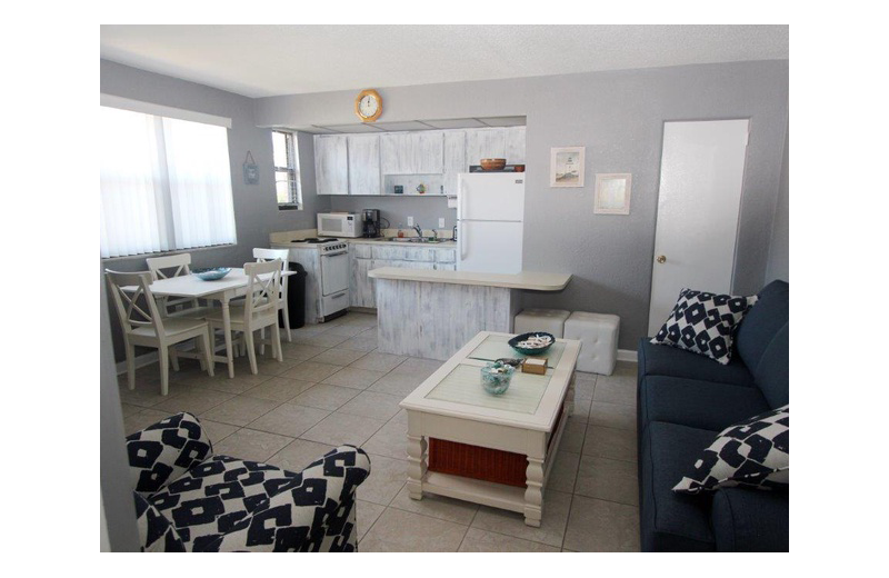 Guest kitchen and living room at Gulf Winds Resort Condominiums.