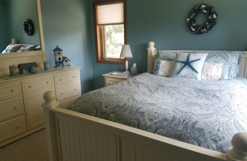 Rental bedroom at Oceanfront Getaways.