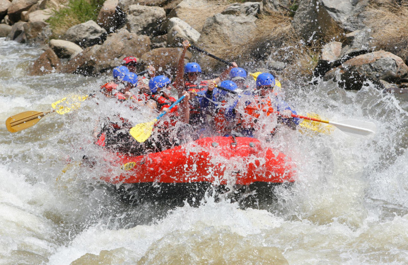 River rafting near Grand Timber Lodge.