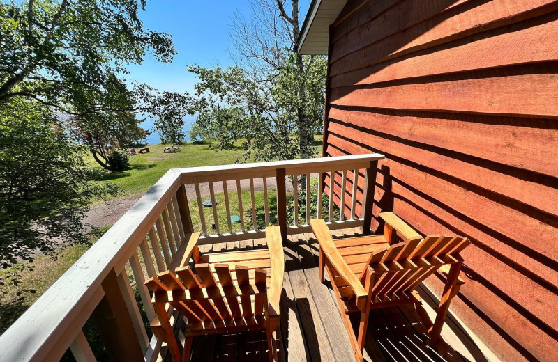 Guest balcony at Thomsonite Beach Inn & Suites.