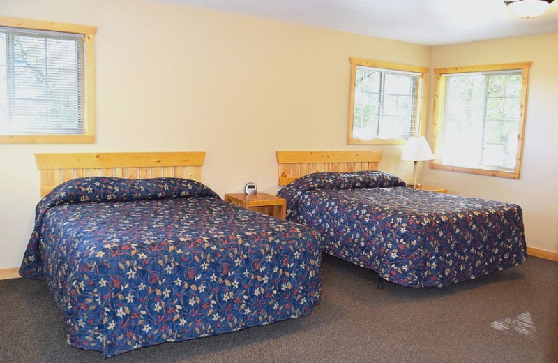 Cabin bedroom at Canary Beach Resort.