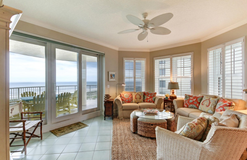 Rental living room at Amelia Rentals and Management Services.