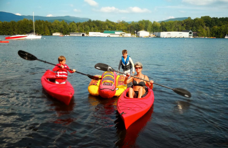 Family kayaking at Contessa Resort.