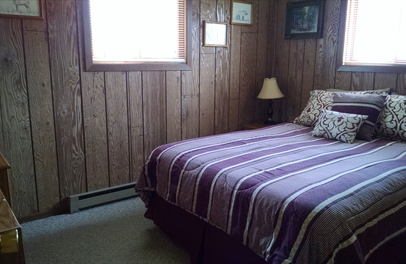 Cabin bedroom at The Arrows Resort.