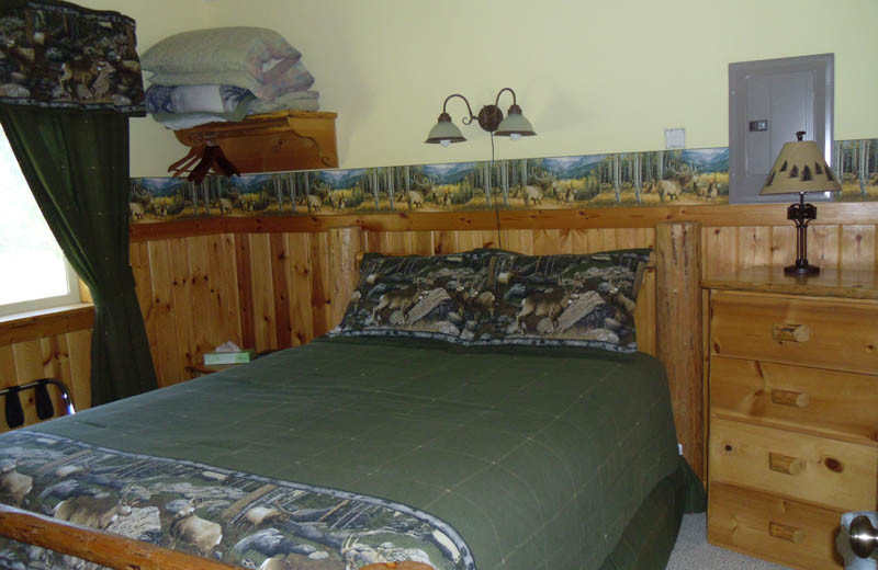 Cabin bedroom at Glaciers' Mountain Resort.