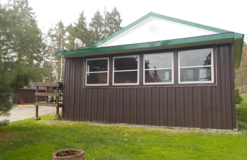 Cabin exterior at Owls Nest Lodge.